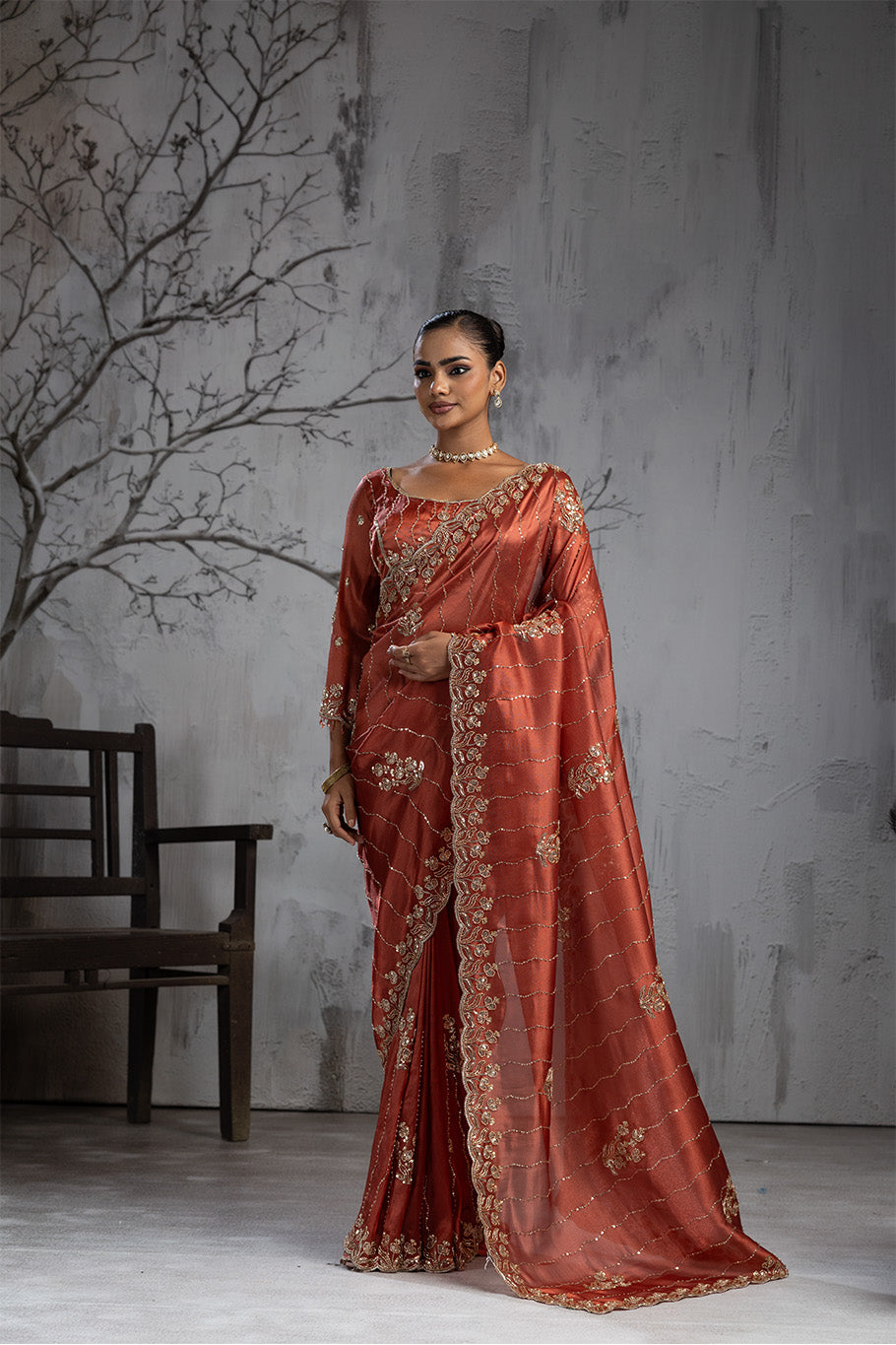 Rusty Orange Organza Silk Saree with Golden Floral Embroidery