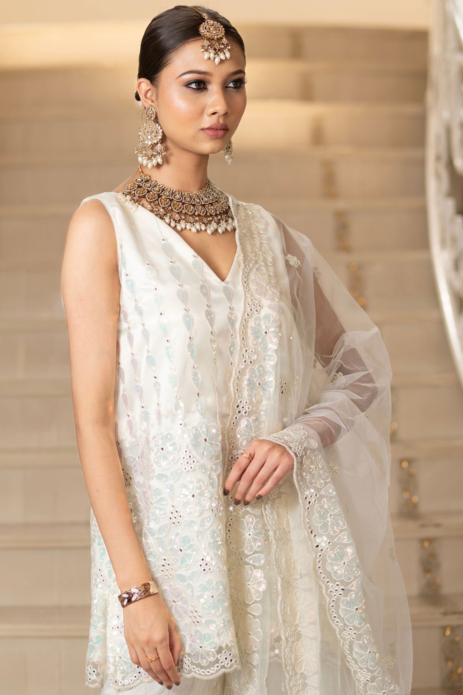 Ivory Pearl White Super Net Sleeveless Kurta With Flared Palazzo Set - Mayrake.in