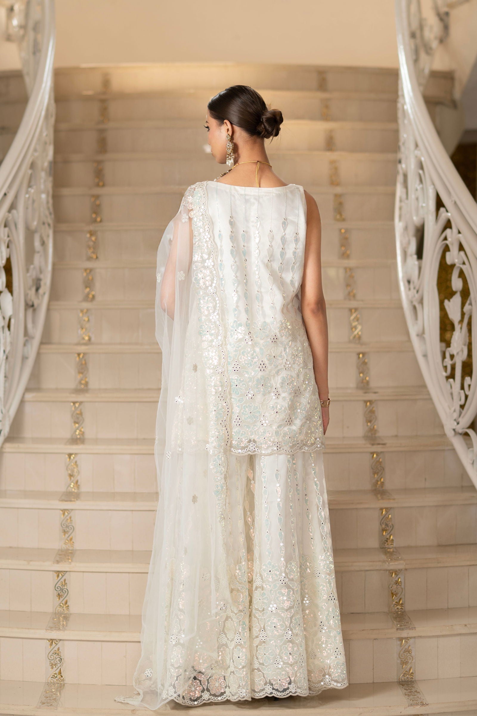 Ivory Pearl White Super Net Sleeveless Kurta With Flared Palazzo Set - Mayrake.in