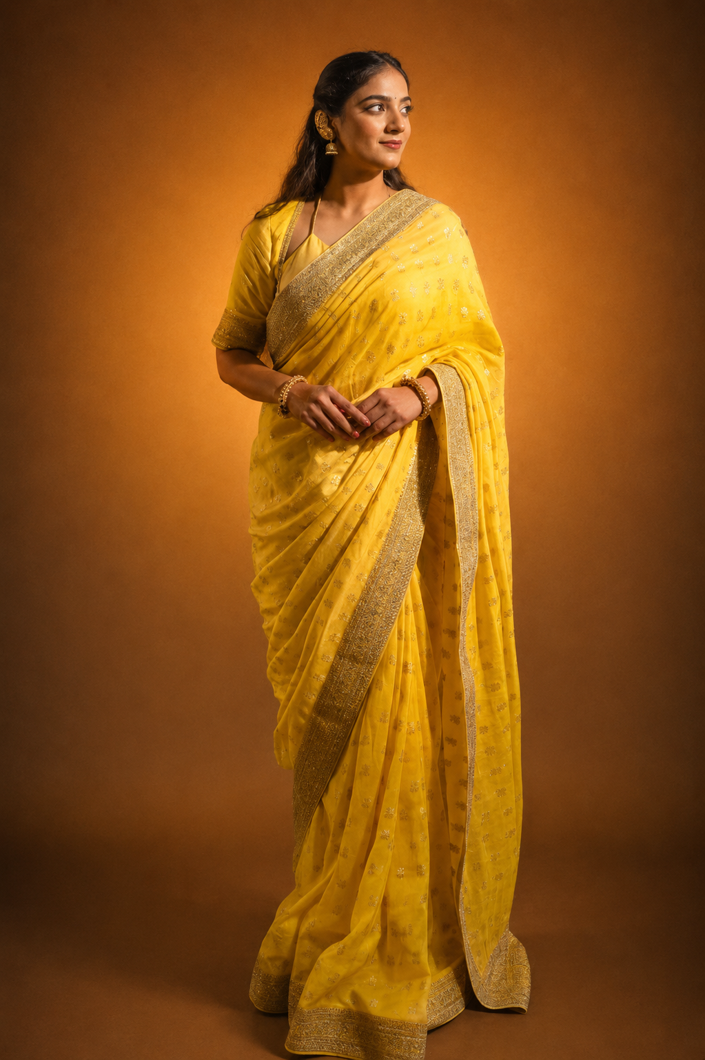 Yellow Silk Saree with Golden Buti Work and Rich Zari Border