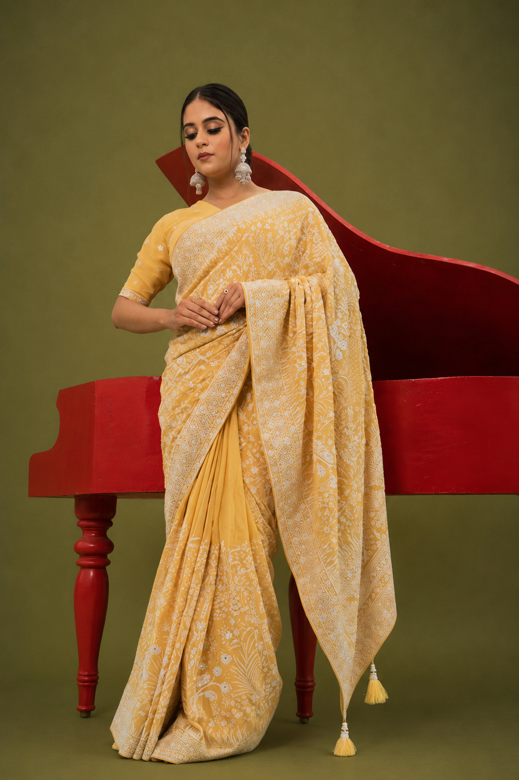 Light Yellow Lucknowi Georgette Saree with Beautiful Tassels and Zari Work