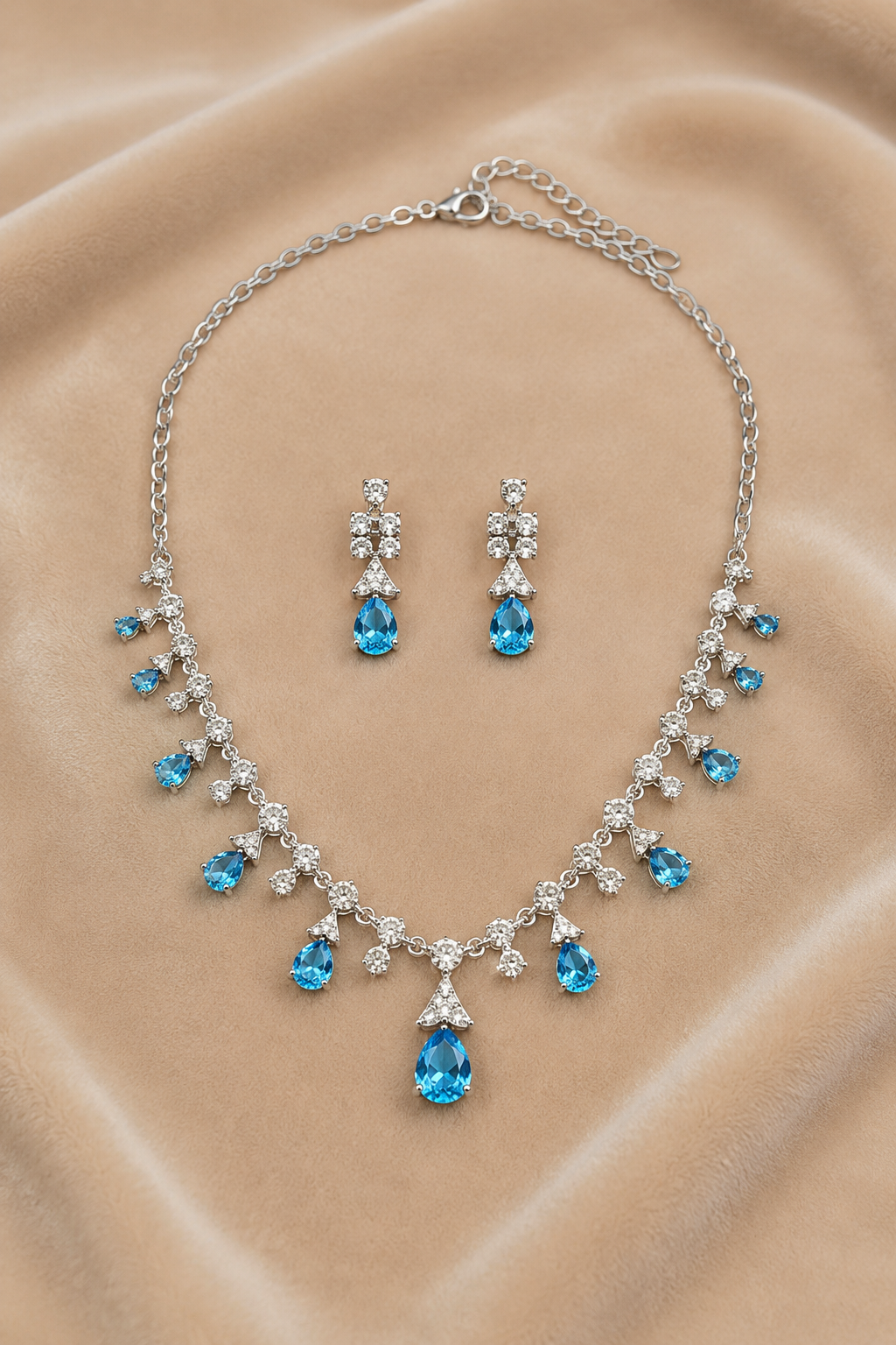 Sky Blue Teardrop Stone Necklace Set with Floral Diamond-Studded Detailing