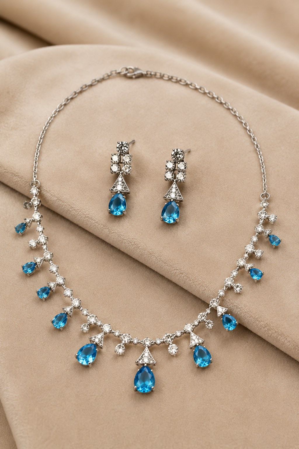 Sky Blue Teardrop Stone Necklace Set with Floral Diamond-Studded Detailing