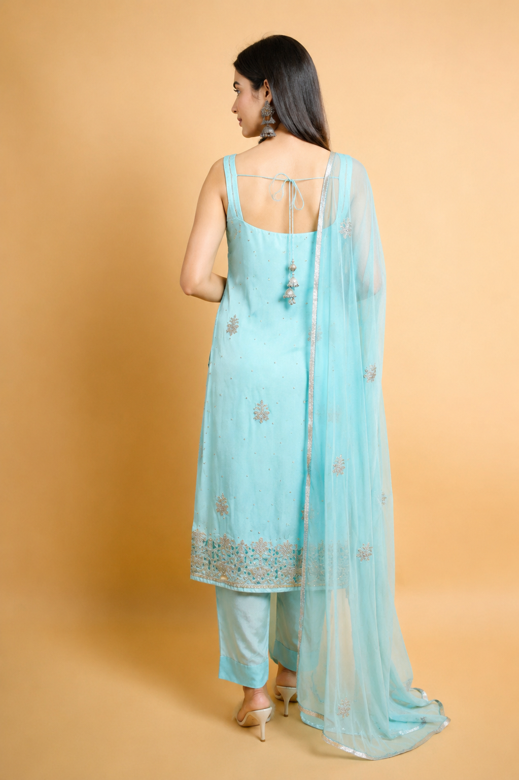 Sky Blue Swarovski Cutwork Suit with Padded Sleeveless Design
