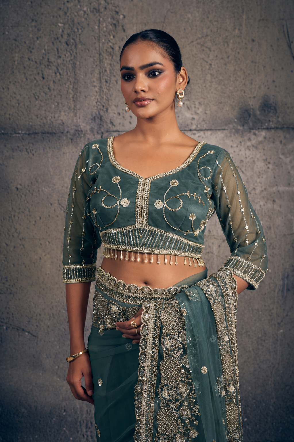 Emerald Green Net Saree with Hand Embroidery with Stitched Blouse