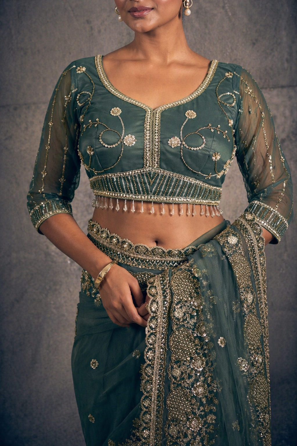 Emerald Green Net Saree with Hand Embroidery with Stitched Blouse