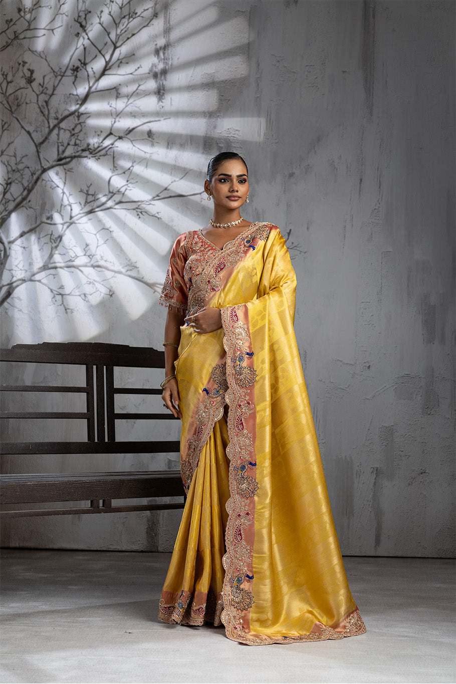 Yellow Banarasi Organza Saree with Pink Border and Multicolor Zari Embroidery
