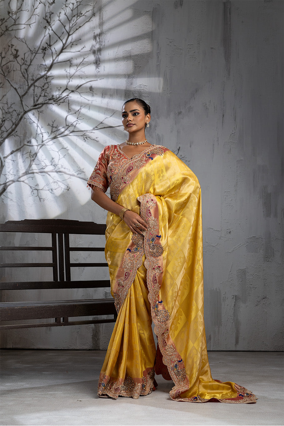 Yellow Banarasi Organza Saree with Pink Border and Multicolor Zari Embroidery