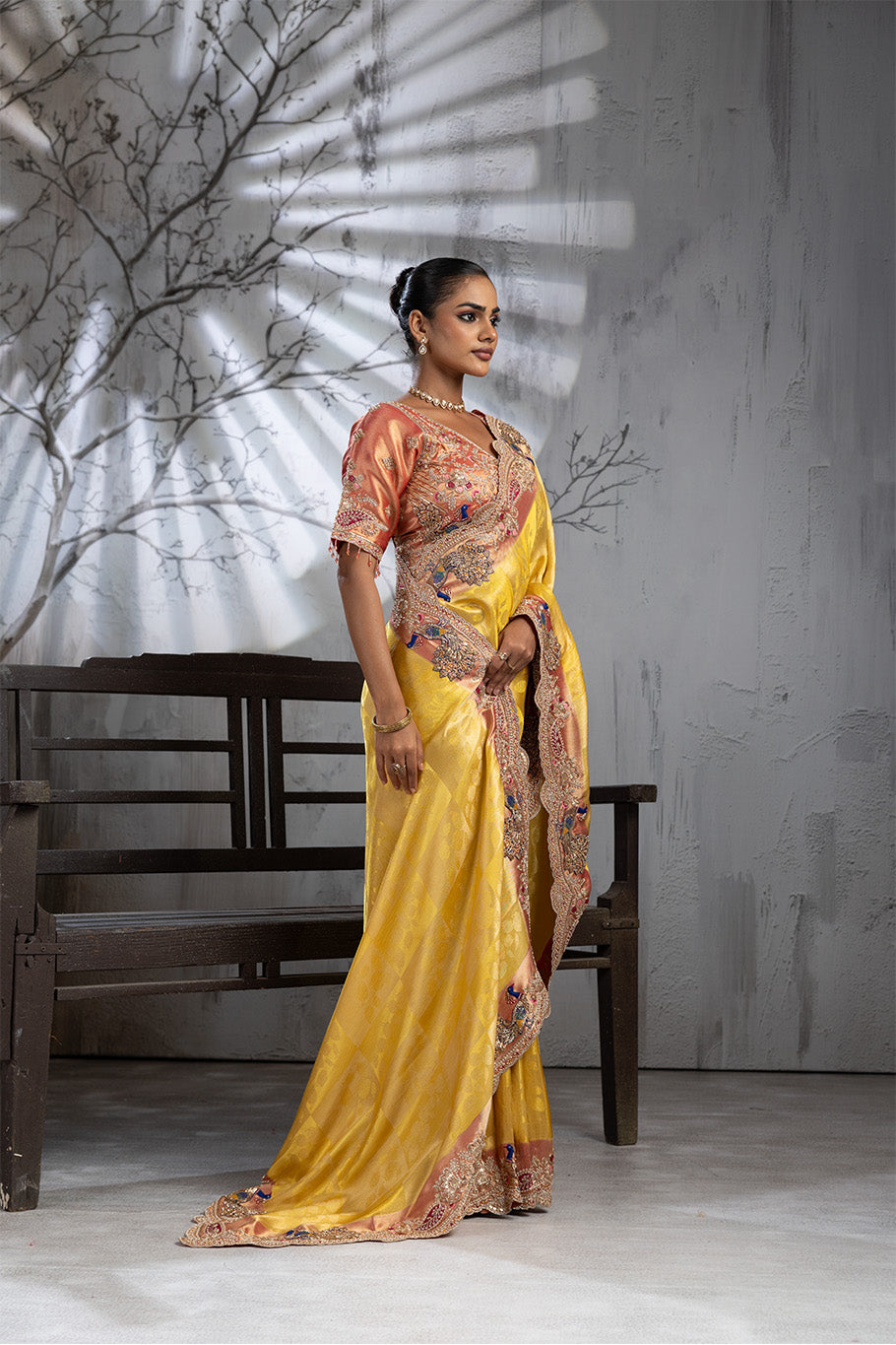 Yellow Banarasi Organza Saree with Pink Border and Multicolor Zari Embroidery