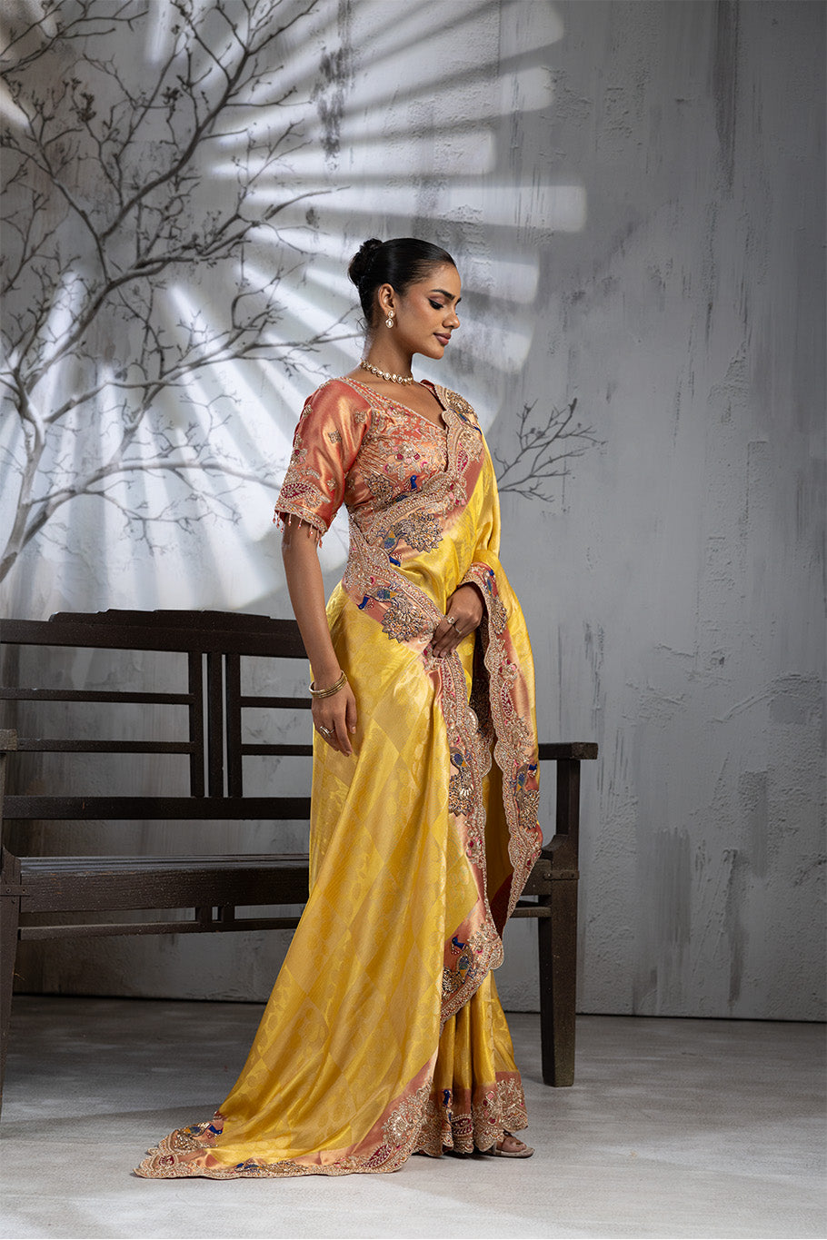 Yellow Banarasi Organza Saree with Pink Border and Multicolor Zari Embroidery