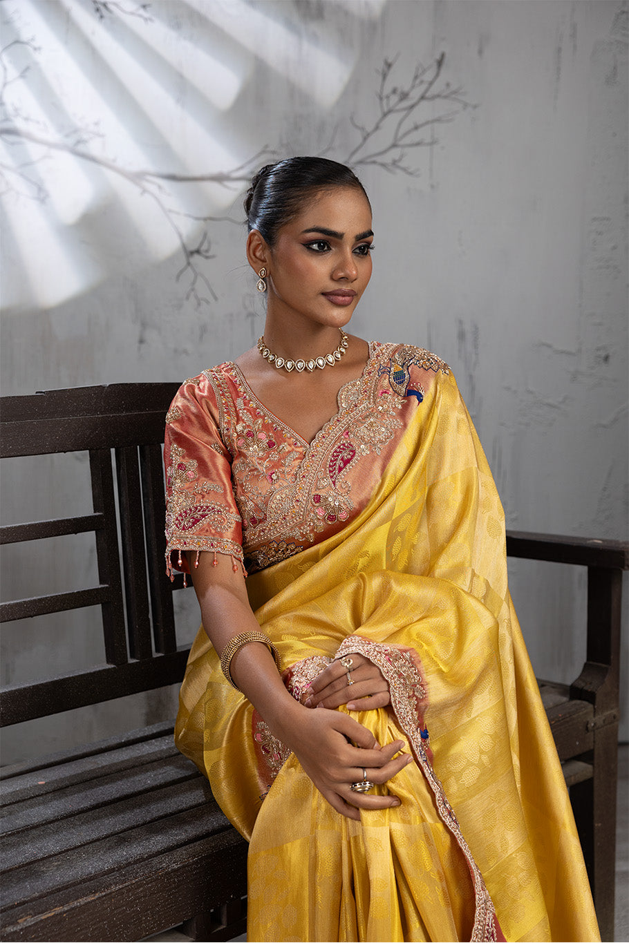 Yellow Banarasi Organza Saree with Pink Border and Multicolor Zari Embroidery