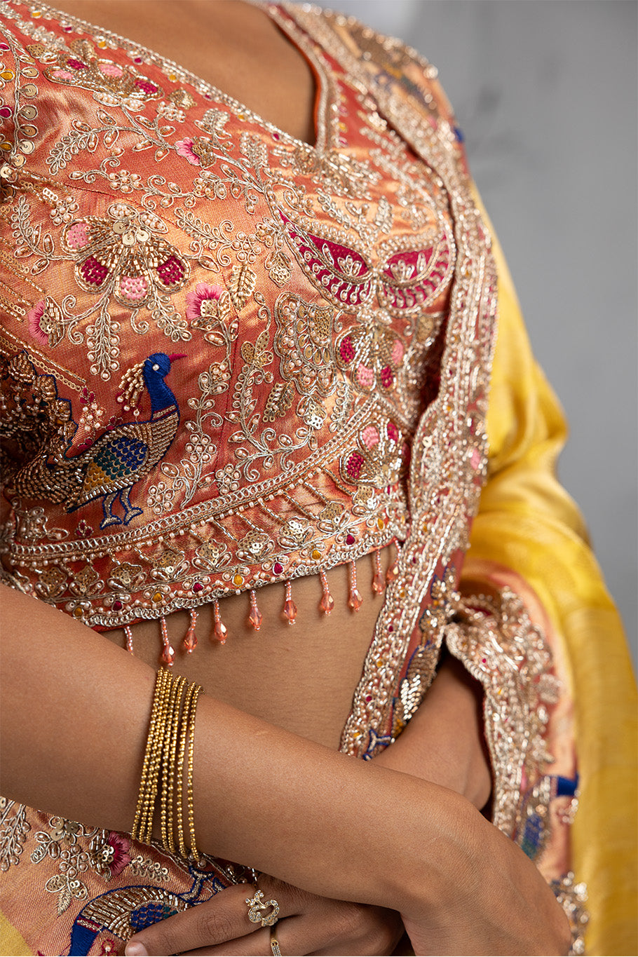Yellow Banarasi Organza Saree with Pink Border and Multicolor Zari Embroidery