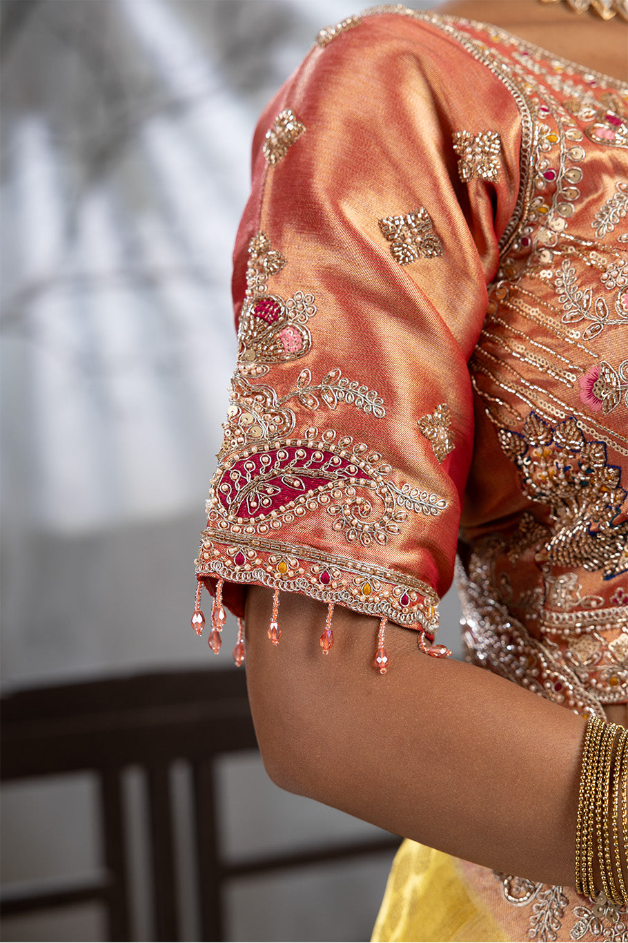 Yellow Banarasi Organza Saree with Pink Border and Multicolor Zari Embroidery
