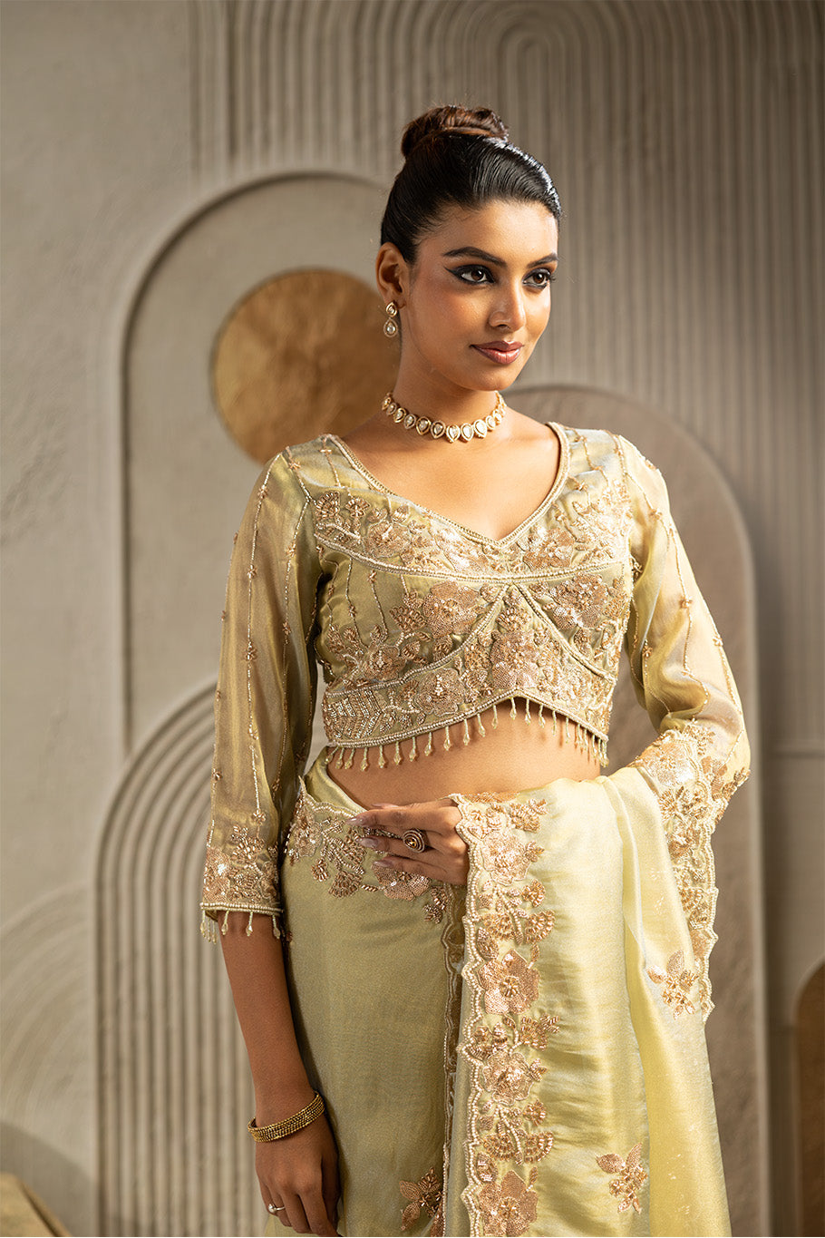 Pista Green Organza Silk Saree with Golden Zari Embroidery