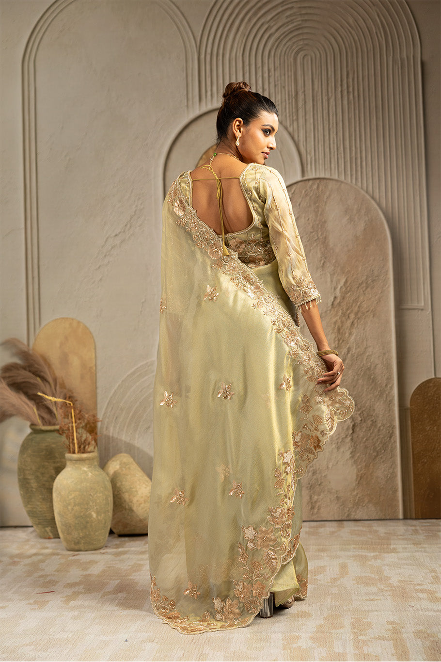 Pista Green Organza Silk Saree with Golden Zari Embroidery