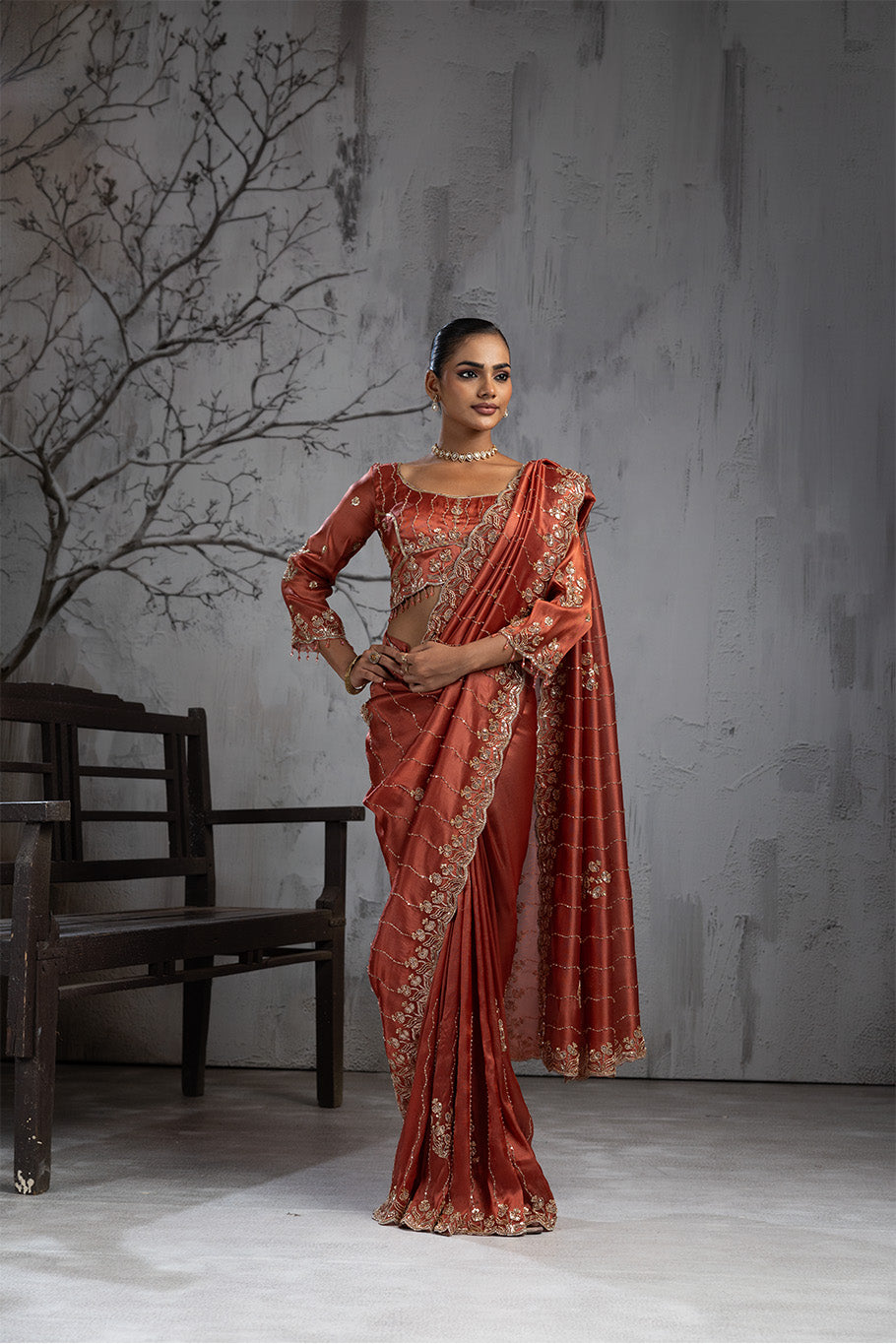 Rusty Orange Organza Silk Saree with Golden Floral Embroidery