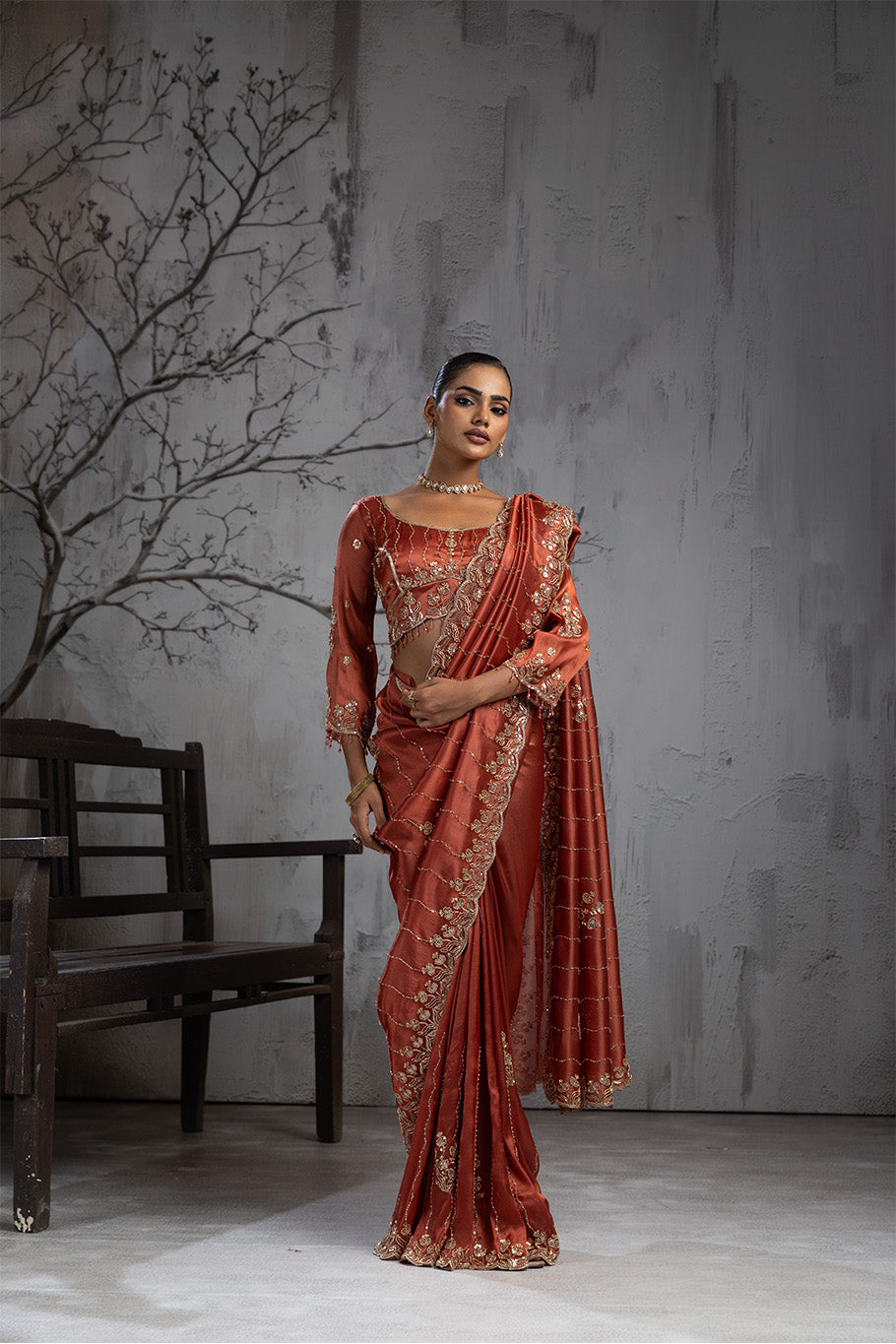 Rusty Orange Organza Silk Saree with Golden Floral Embroidery