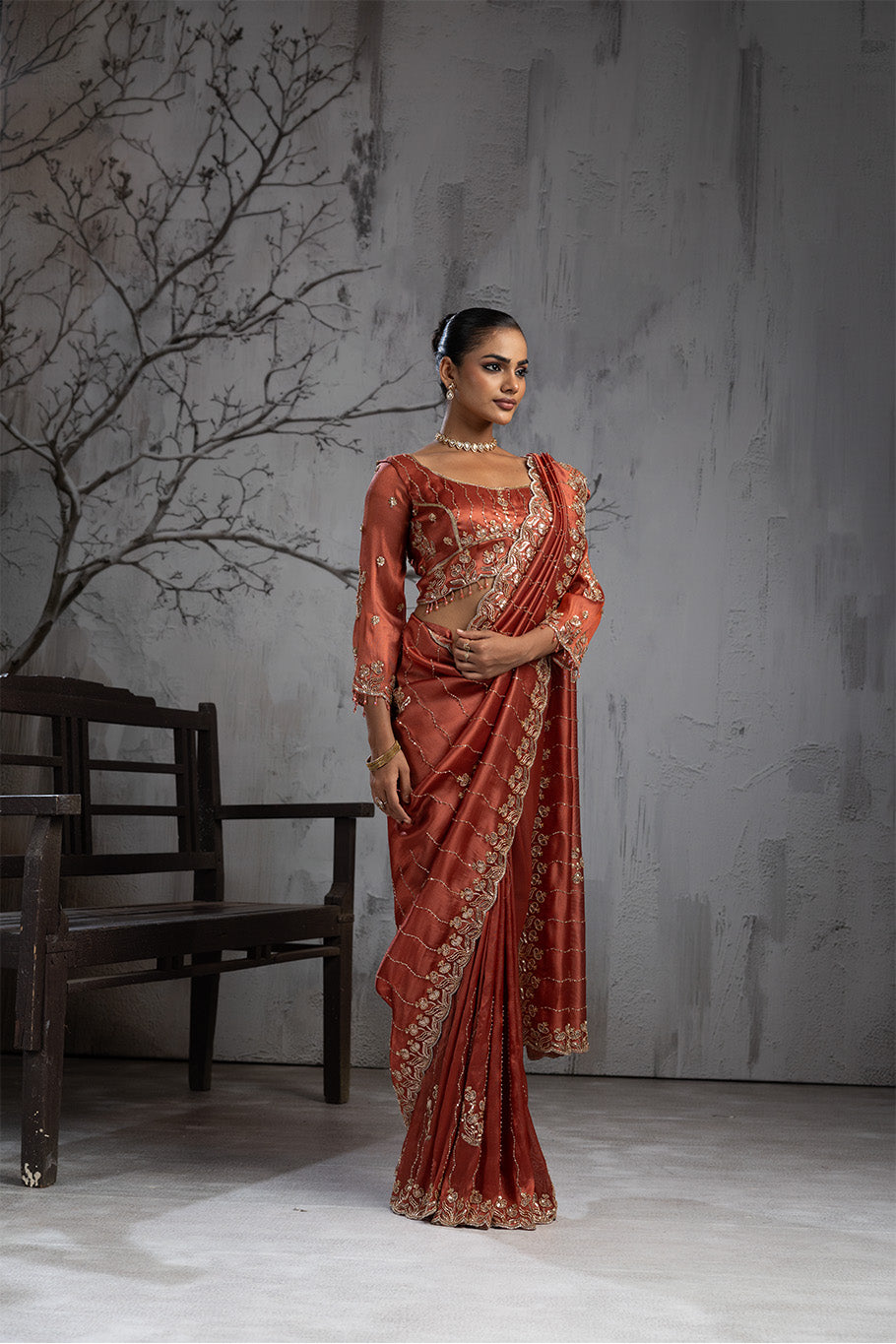 Rusty Orange Organza Silk Saree with Golden Floral Embroidery