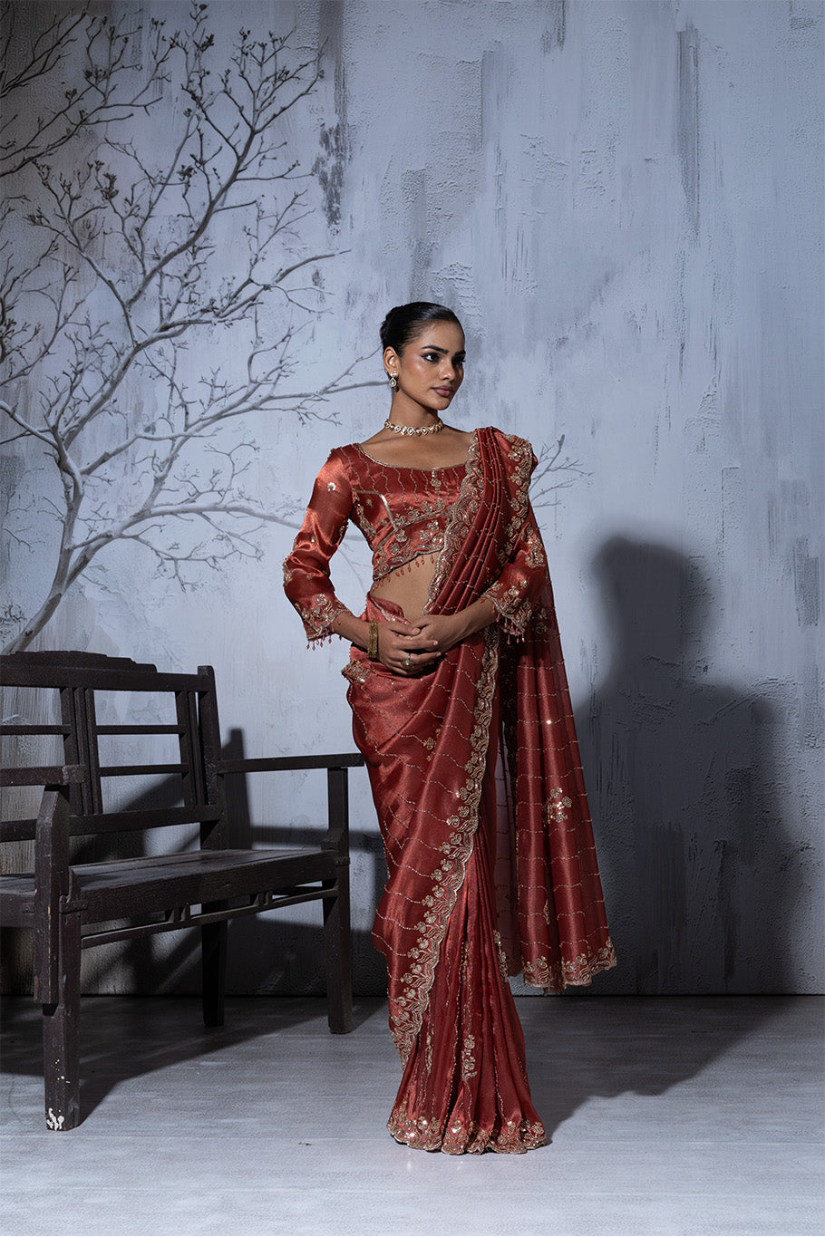 Rusty Orange Organza Silk Saree with Golden Floral Embroidery