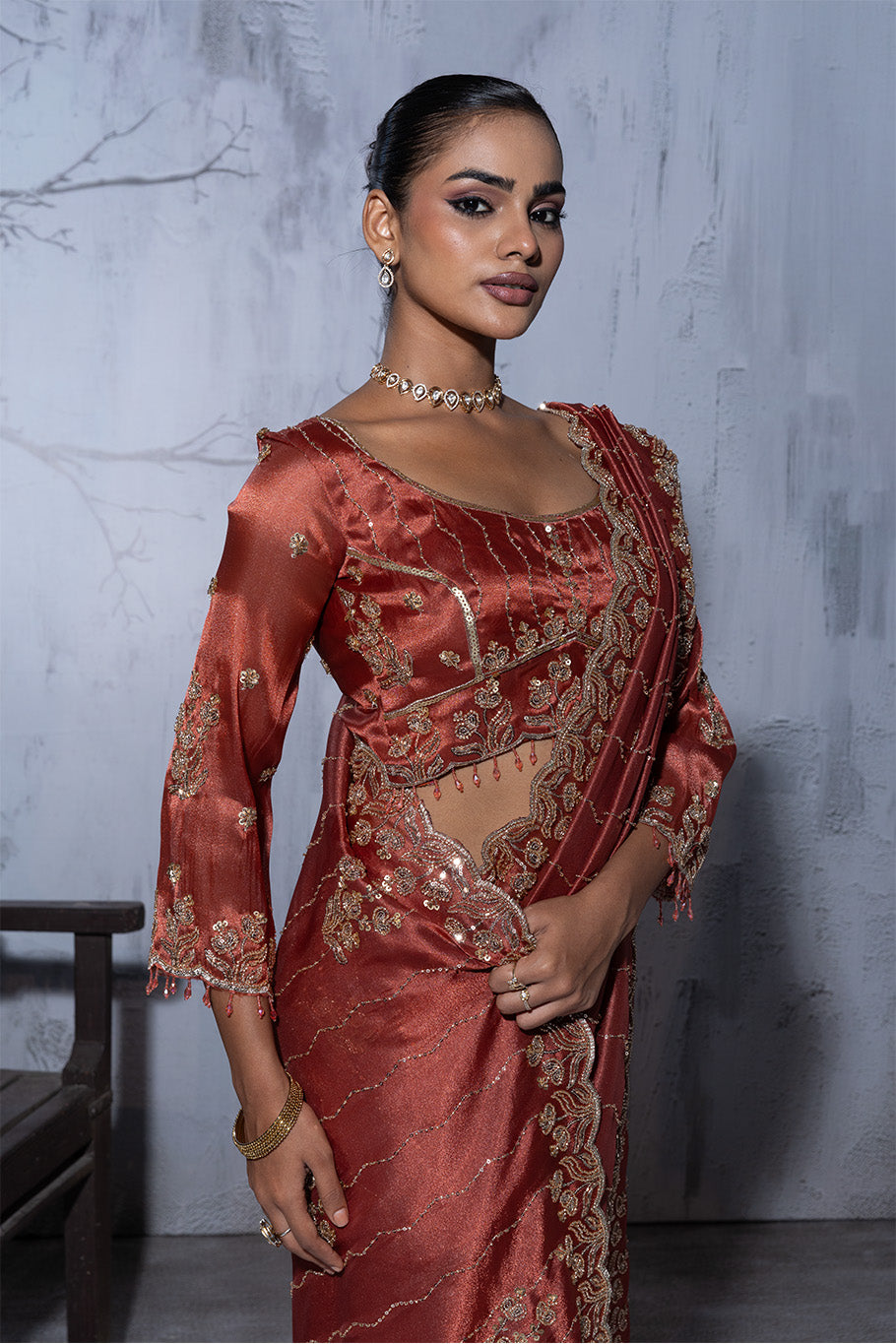 Rusty Orange Organza Silk Saree with Golden Floral Embroidery