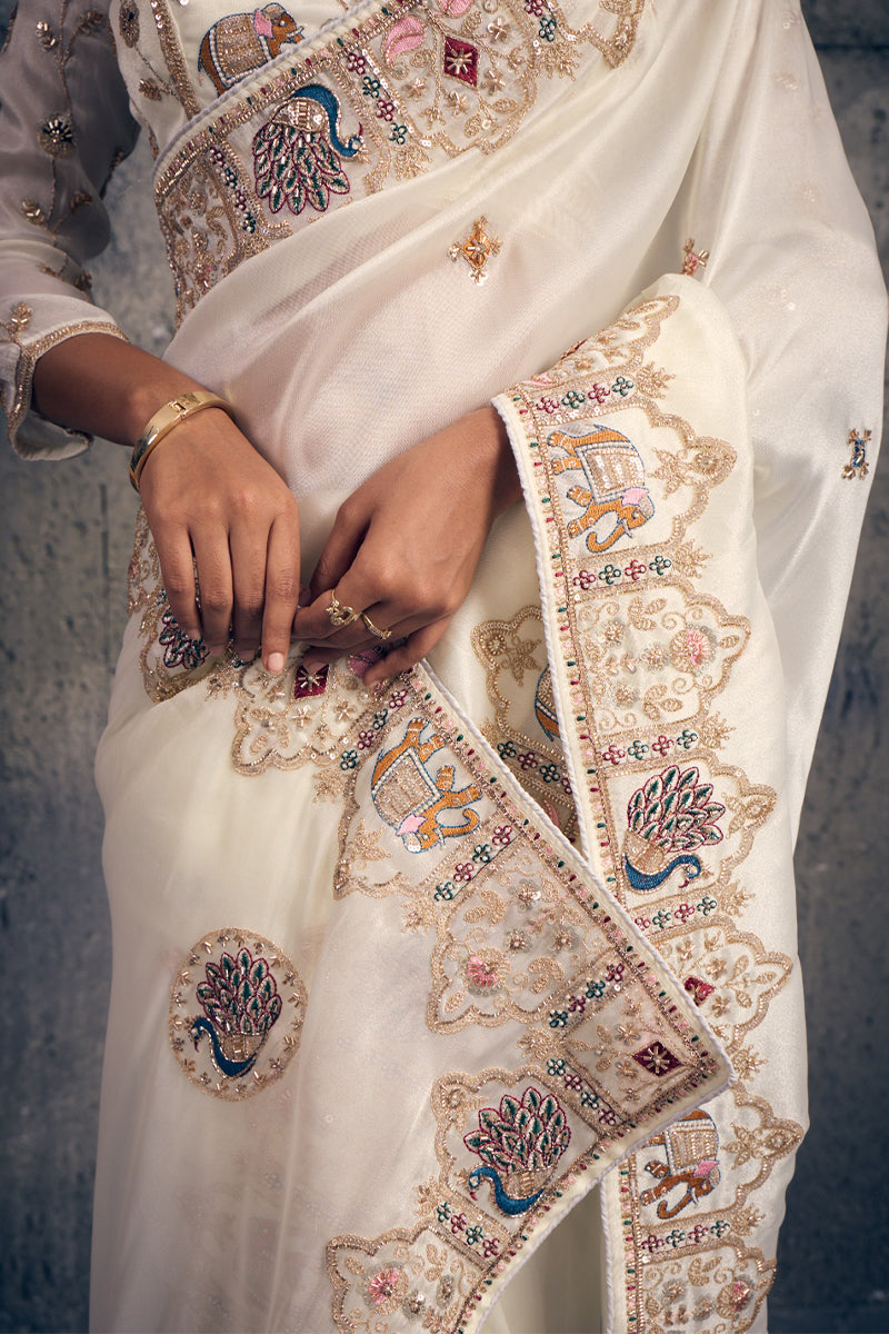 Ivory White Organza Saree with Peacock Hand Embroidery with Stitched Blouse