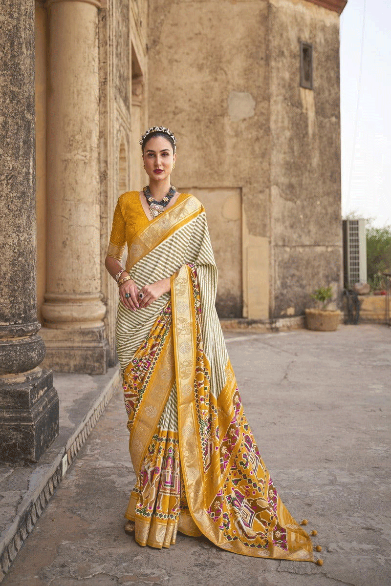Yellow Raw Silk Saree with Silver Zari Border