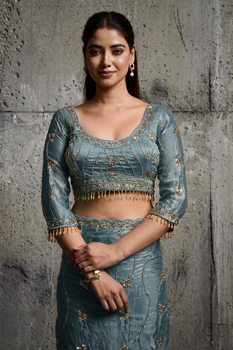 Teal Blue Organza Saree with Hand Embroidery with Stitched Blouse