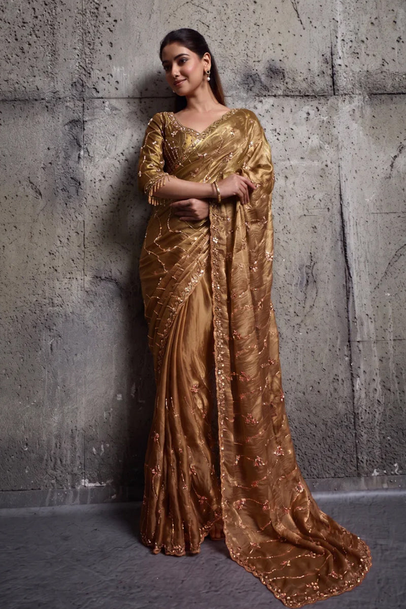 Metalic golden Organza Saree with Hand Embroidery with Stitched Blouse