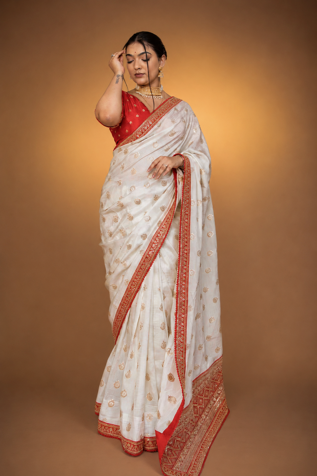 Cream Silk Saree with Golden Buti Work and Rich Red Zari Border