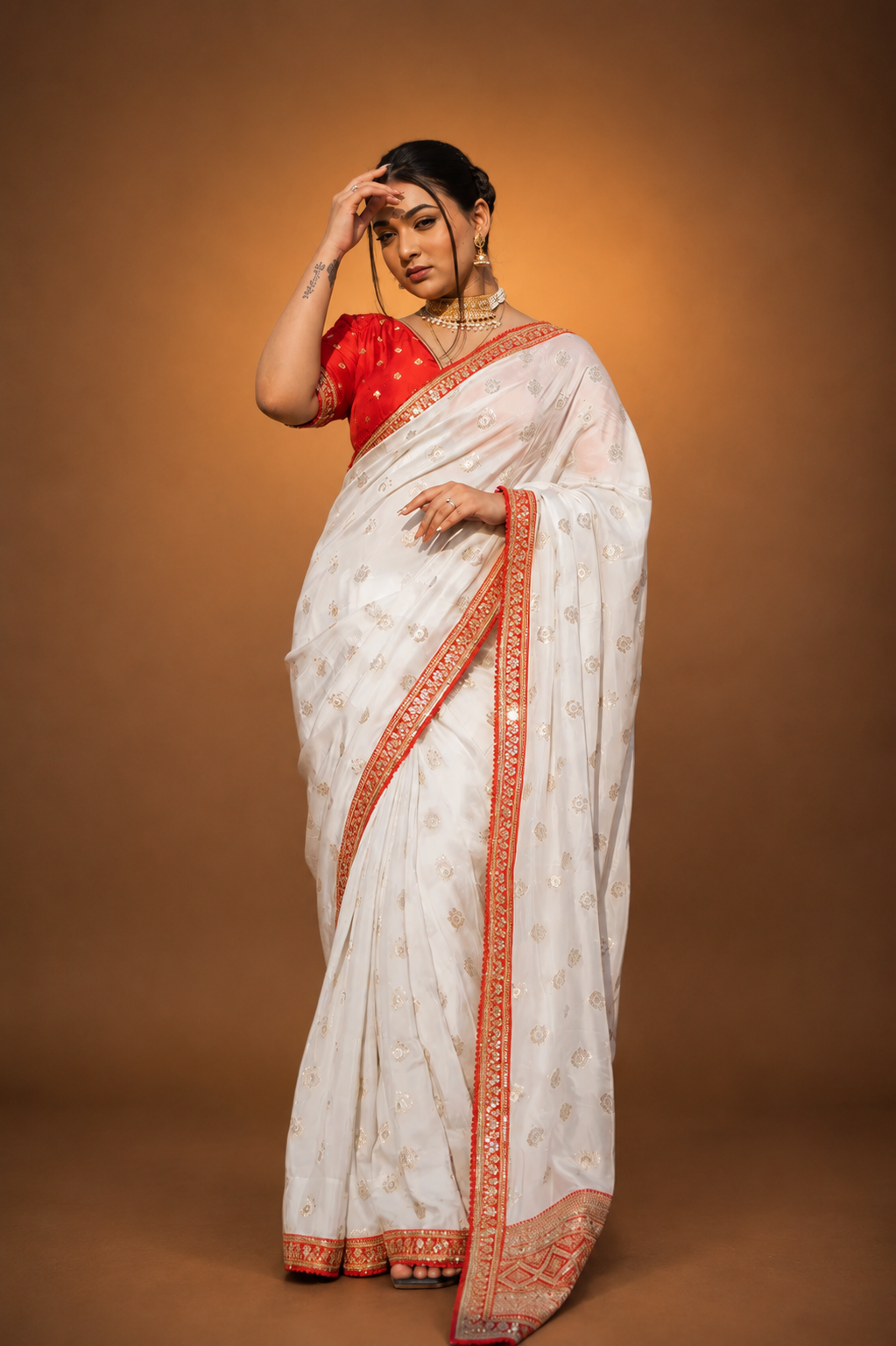 Cream Silk Saree with Golden Buti Work and Rich Red Zari Border