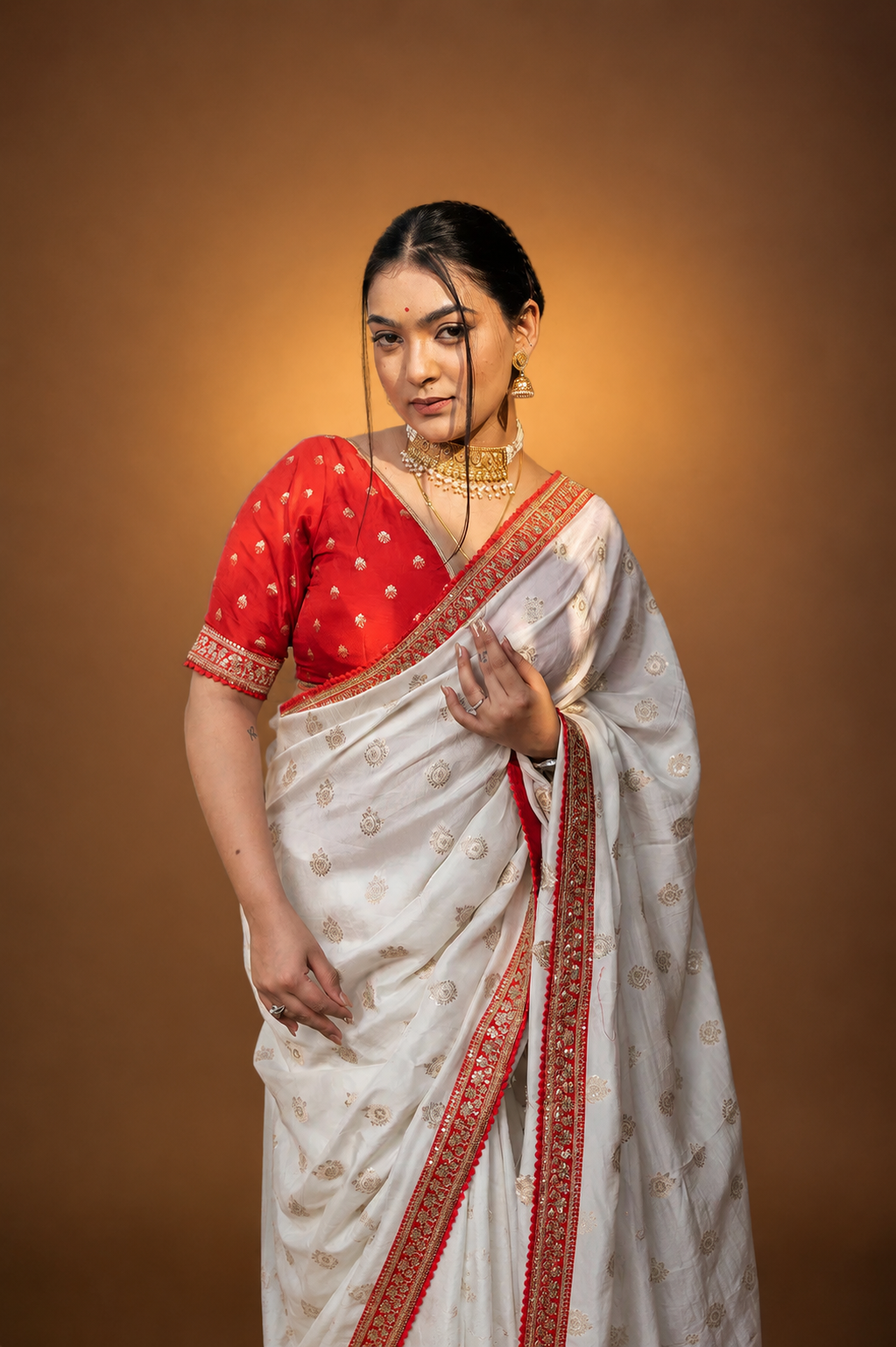 Cream Silk Saree with Golden Buti Work and Rich Red Zari Border