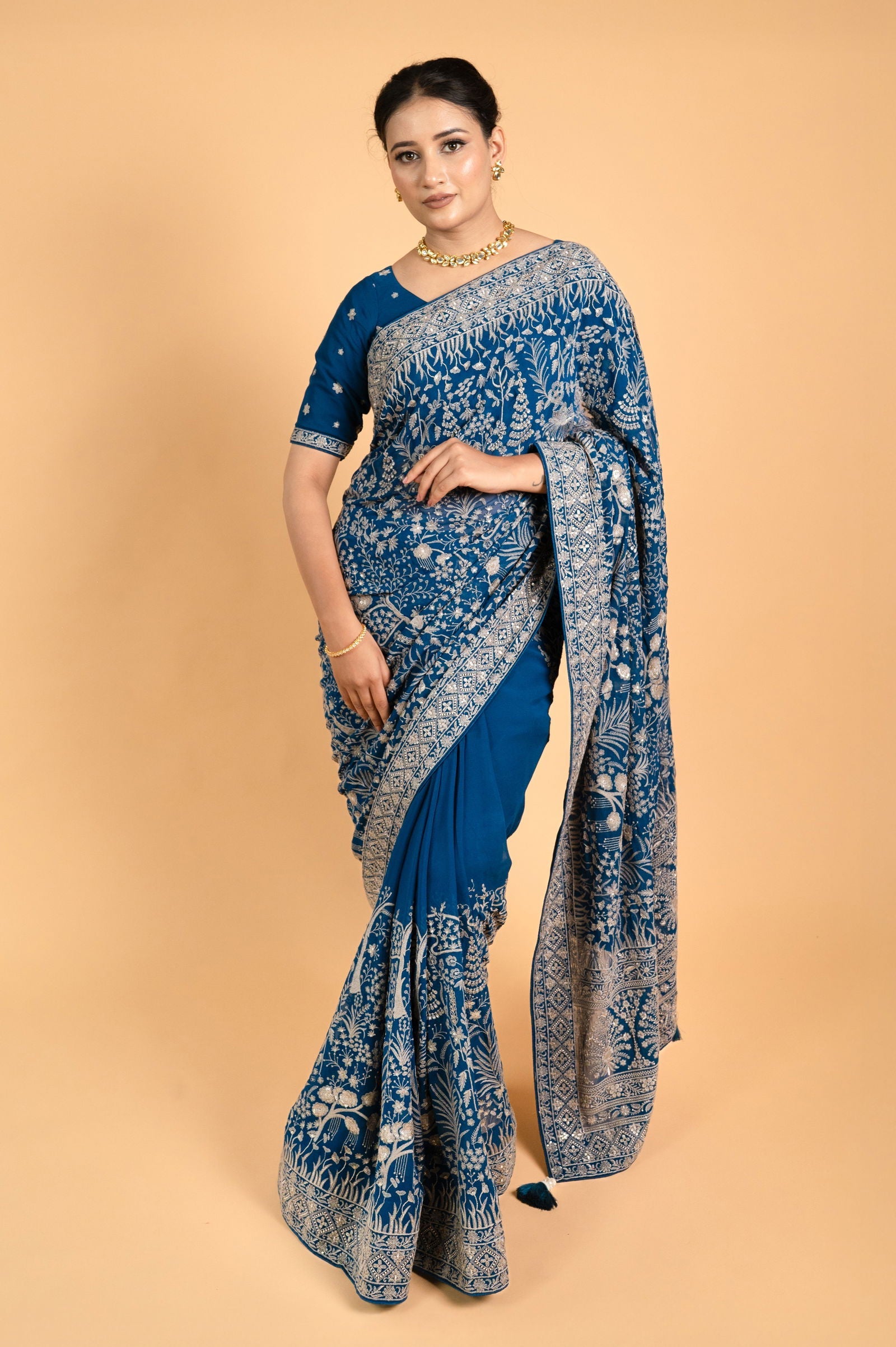 Teal Blue Lucknowi Georgette Saree with Beautiful Tassels and Zari Work - Mayrake.in