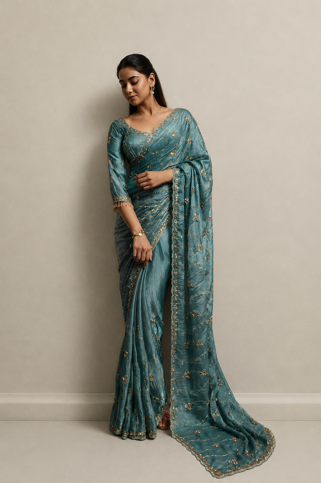 Teal Blue Organza Saree with Hand Embroidery with Stitched Blouse