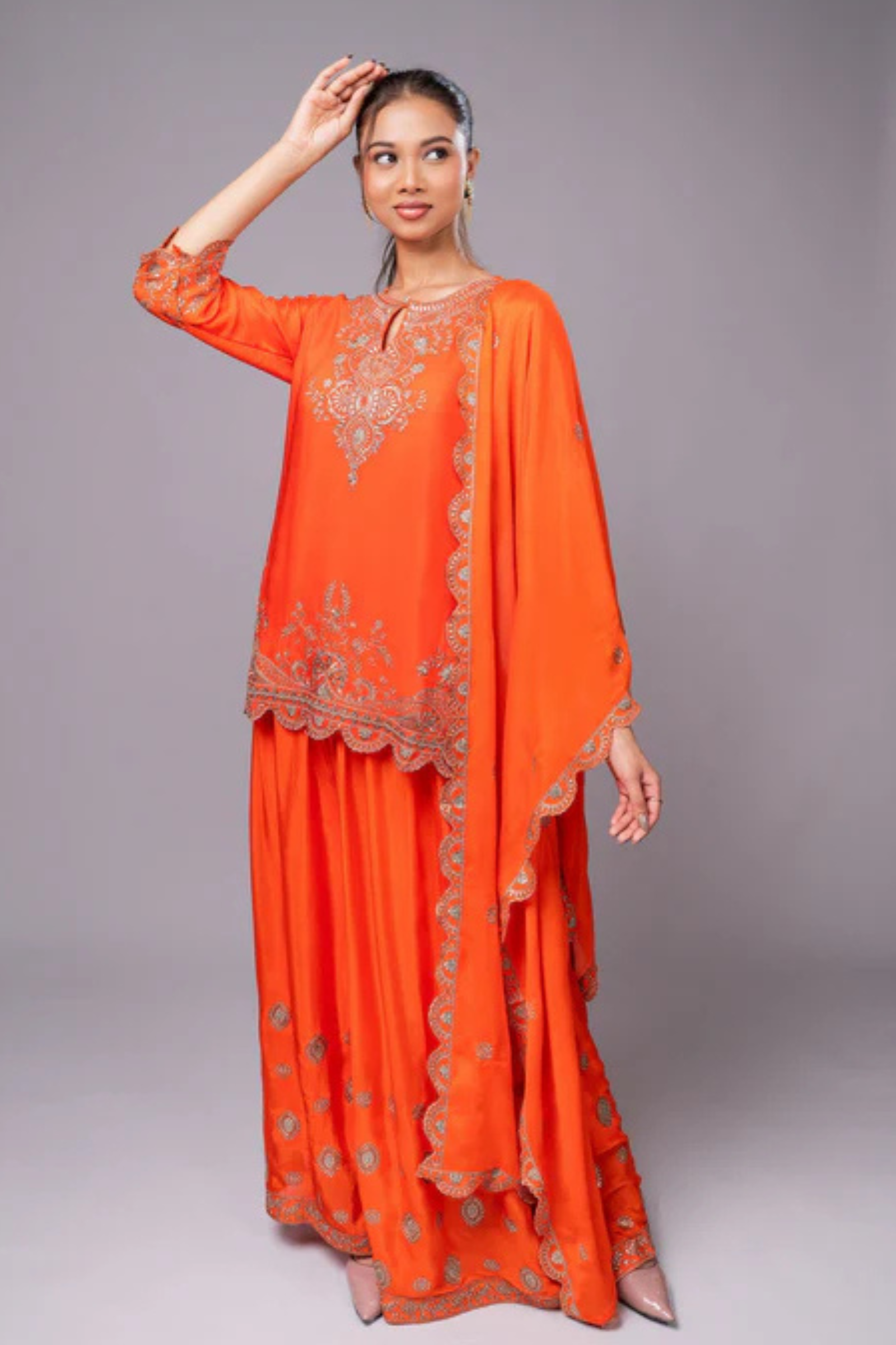 Orange Crepe Kurta Sharara Set with Golden Zari Embroidery