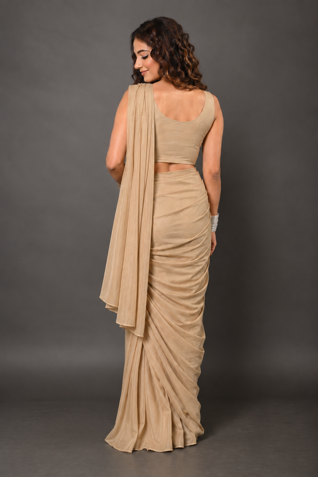 Champagne Beige Lycra Pre-Draped Saree with Sequin Embroidered Blouse