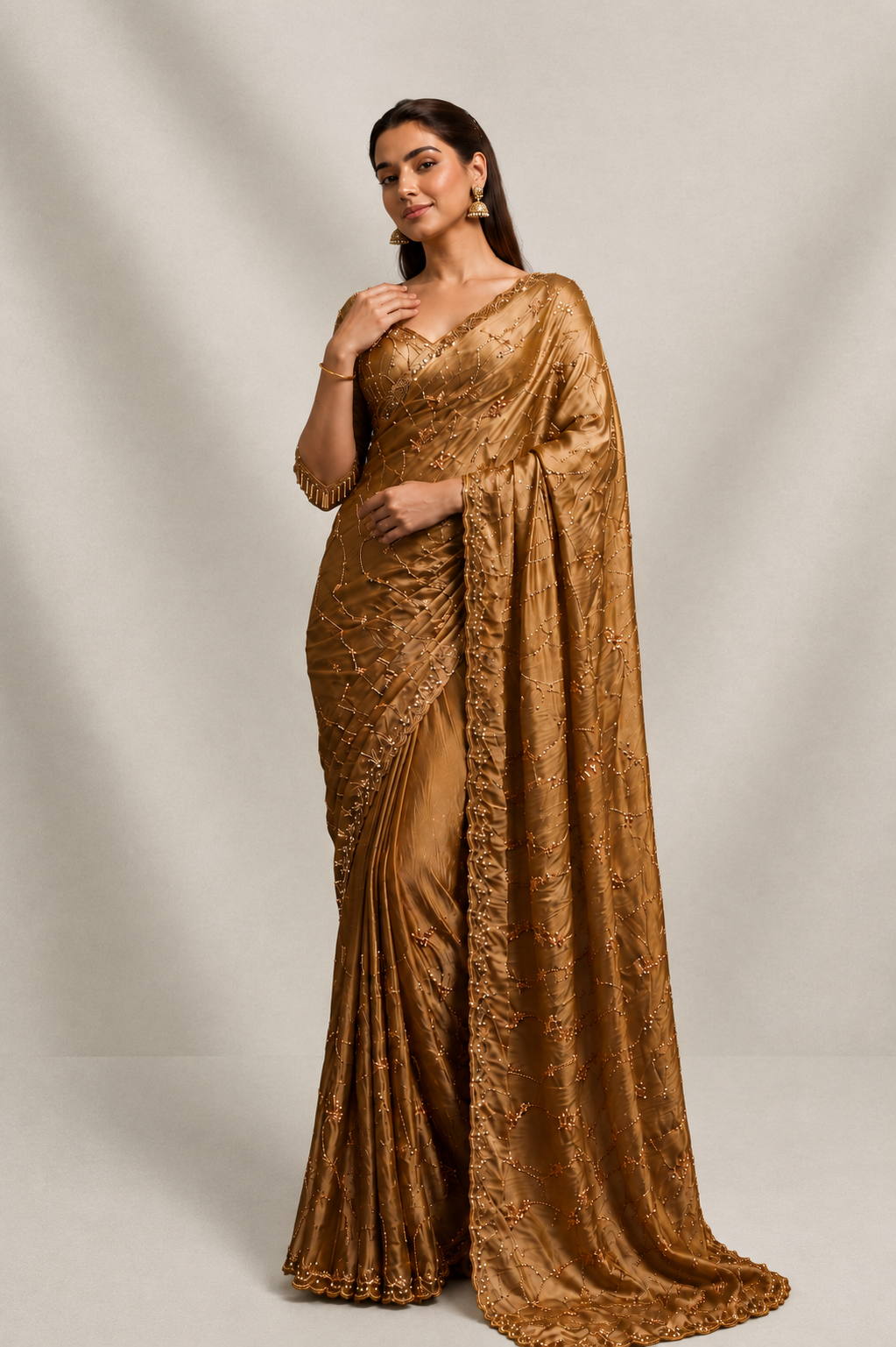Metallic golden Organza Saree with Hand Embroidery with Stitched Blouse