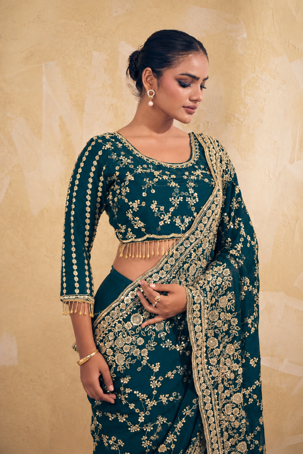 Teal Green Organza Saree with Embroidery work
