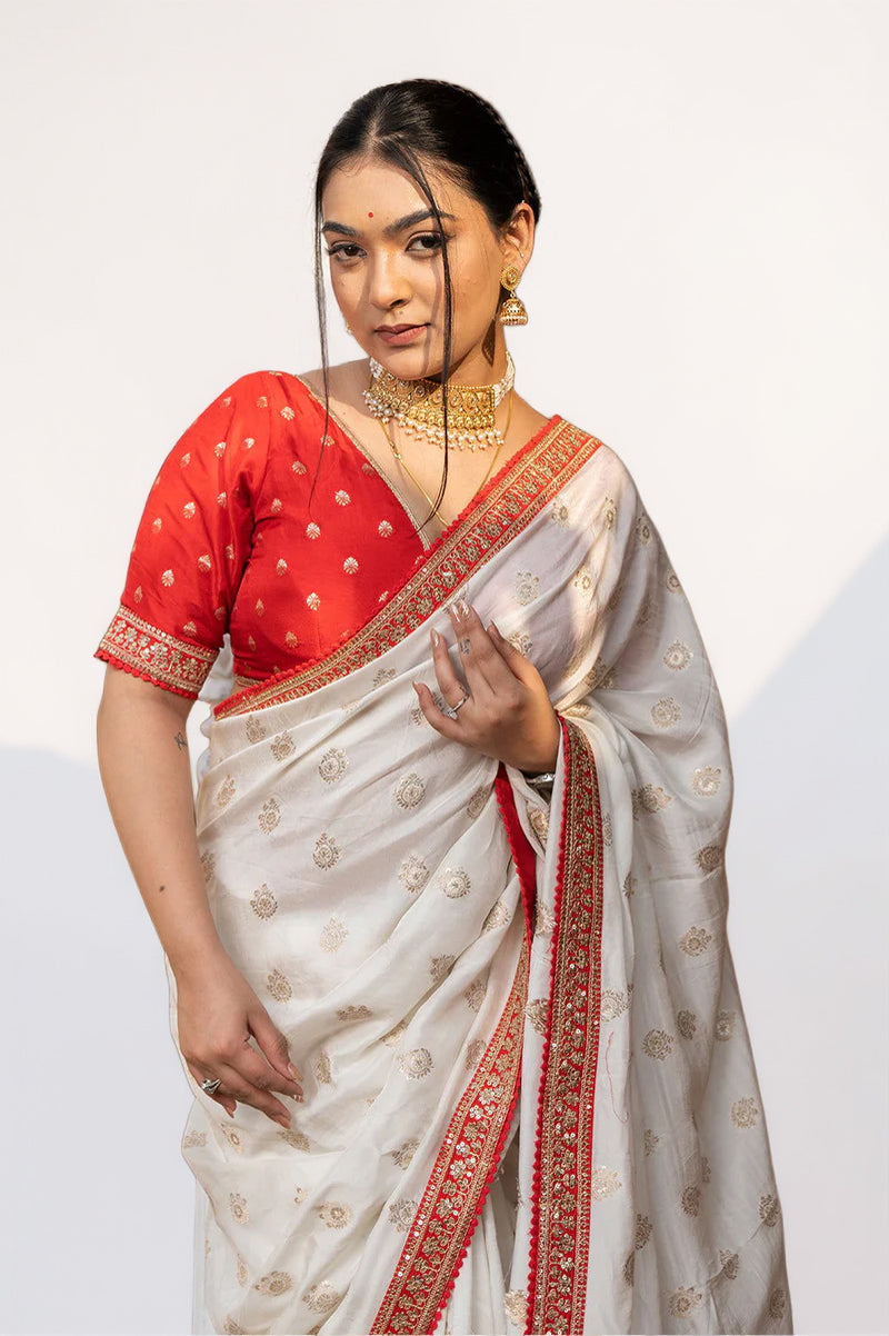 Cream Silk Saree with Golden Buti Work and Rich Red Zari Border