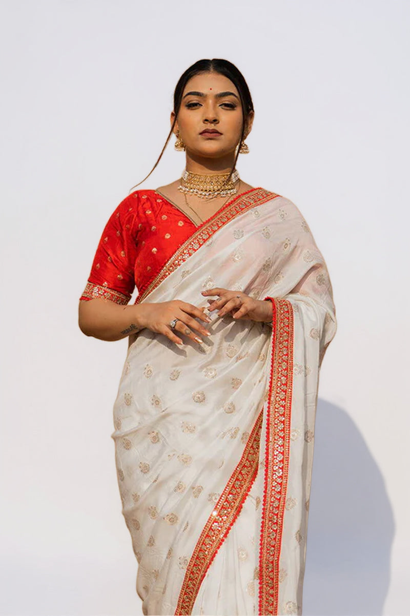 Cream Silk Saree with Golden Buti Work and Rich Red Zari Border