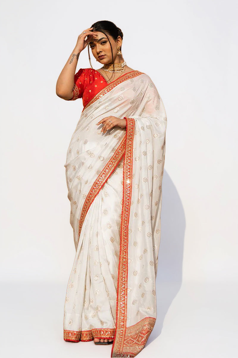 Cream Silk Saree with Golden Buti Work and Rich Red Zari Border