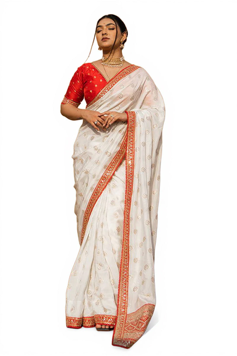 Cream Silk Saree with Golden Buti Work and Rich Red Zari Border