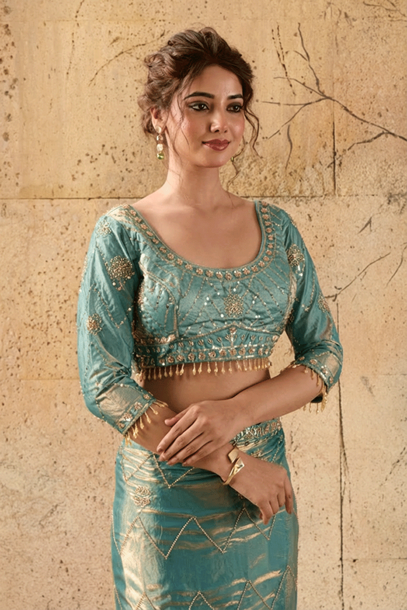 Teal Green Organza Saree with Hand Embroidery with Stitched Blouse