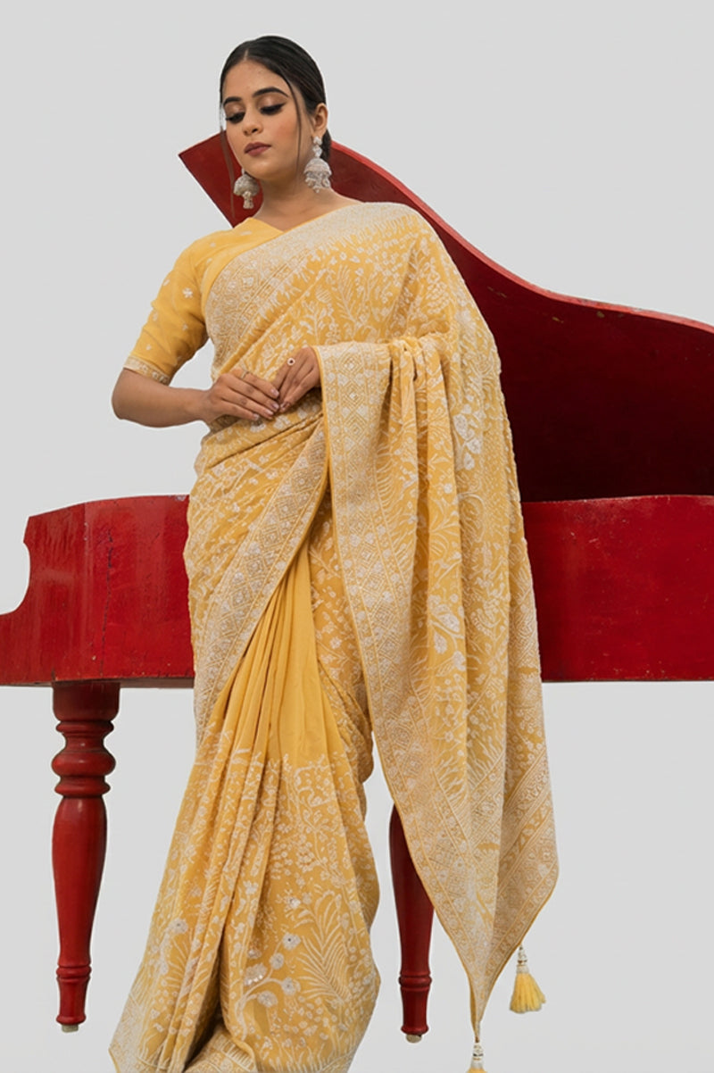 Light Yellow Lucknowi Georgette Saree with Beautiful Tassels and Zari Work