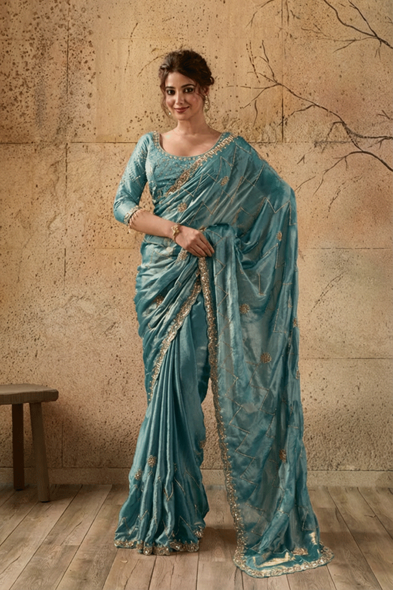 Teal Green Organza Saree with Hand Embroidery with Stitched Blouse