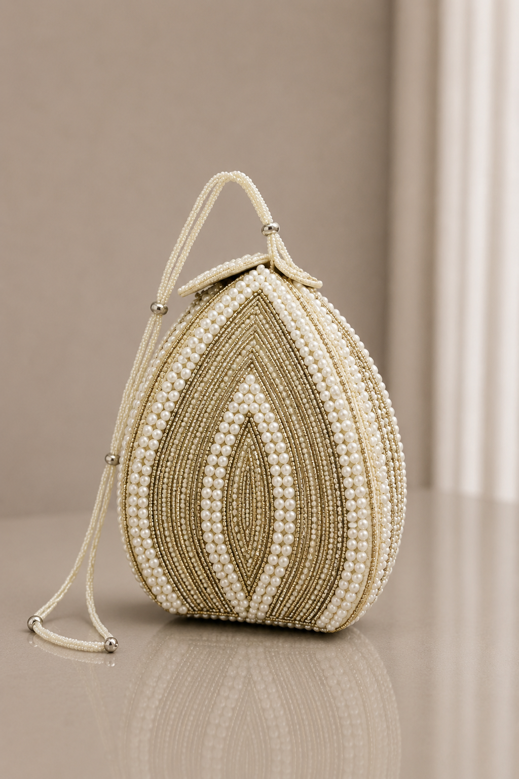 White Pearl with Swarovski Frame Potli and Handmade Pearl Handle