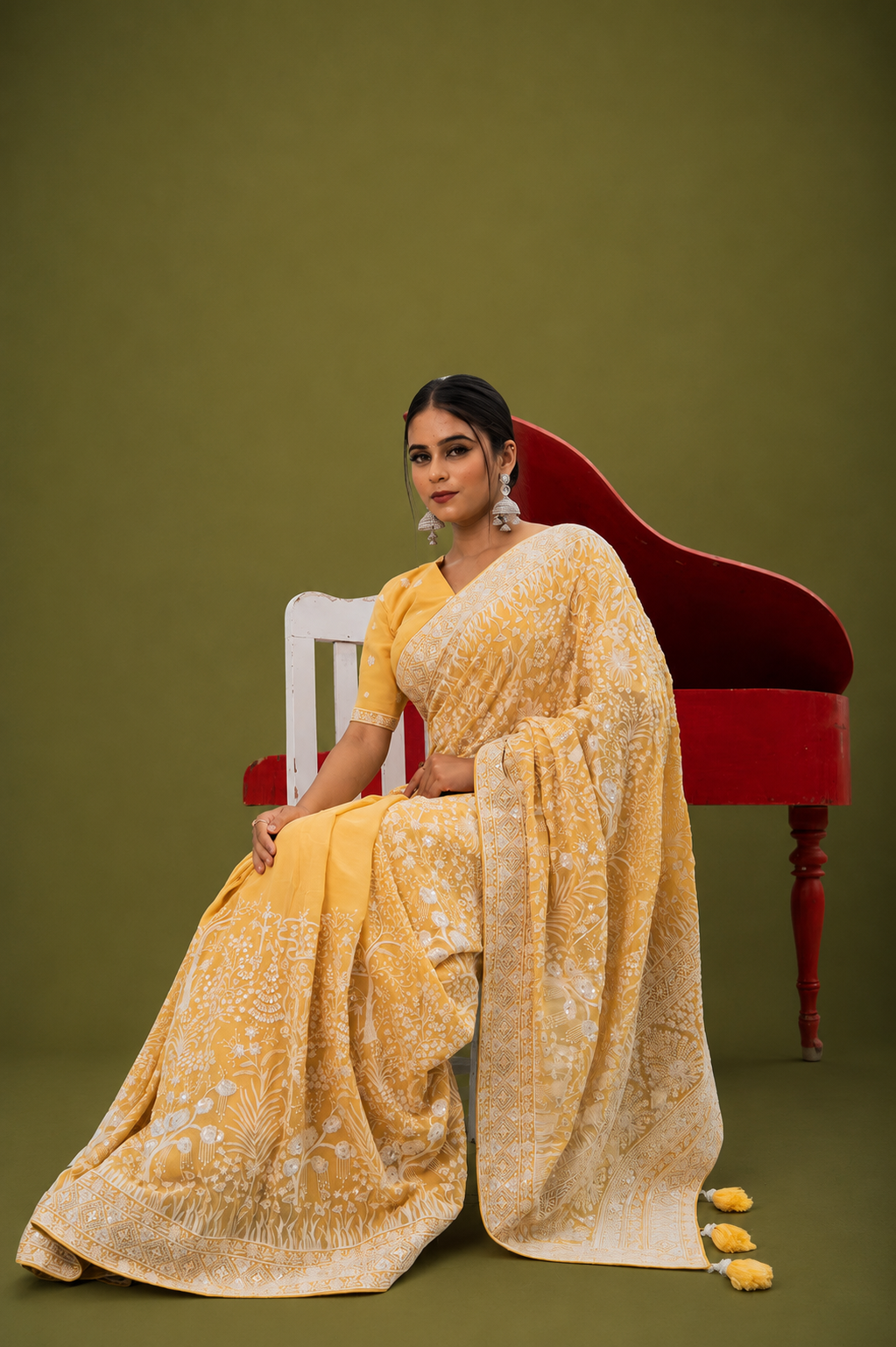 Light Yellow Lucknowi Georgette Saree with Beautiful Tassels and Zari Work